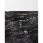 Close-up of Dolce & Gabbana Black Cotton Mid Waist Denim Men Bermuda Short detailing and label.