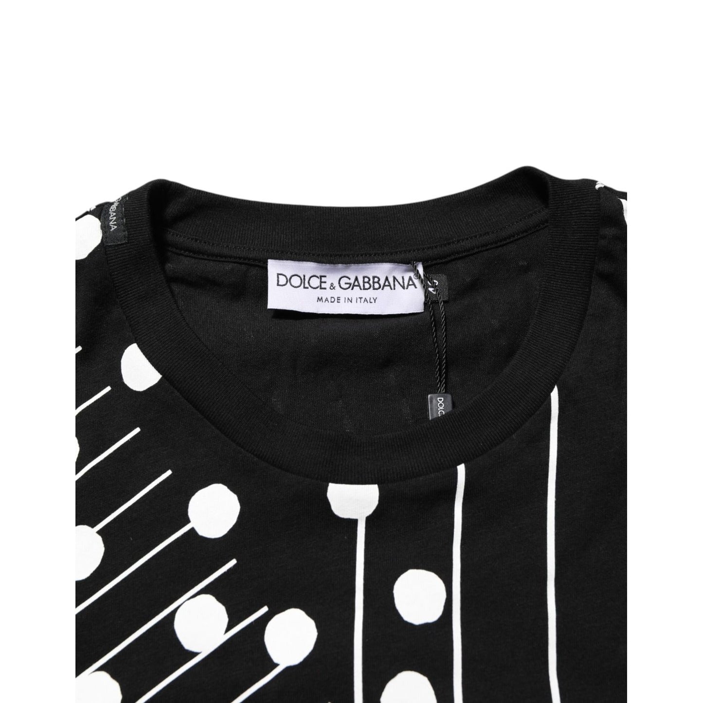 Dolce & Gabbana Black Cotton Polka Dots Round Neck T-shirt with label detail, featuring exclusive design, made in Italy.