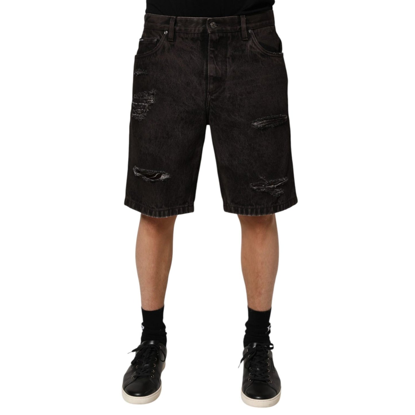 Dolce & Gabbana Black Cotton Tattered Denim Men Bermuda Short featuring distressed design and regular fit for street-style look.