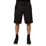 Dolce & Gabbana Black Cotton Tattered Denim Men Bermuda Short featuring distressed design and regular fit for street-style look.