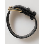 Dolce & Gabbana Black Embossed Leather Gold Buckle Belt Strap Bracelet featuring sleek design and luxurious gold-tone hardware, perfect accessory.