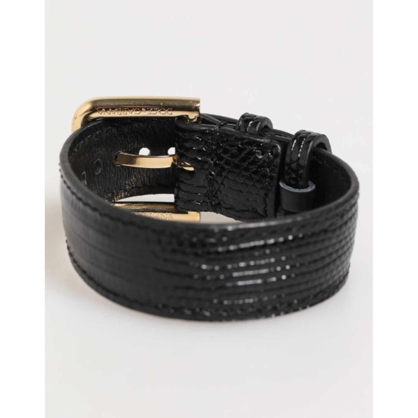 Dolce & Gabbana Black Embossed Leather Gold Buckle Belt Strap Bracelet featuring sleek design and refined gold-tone detailing
