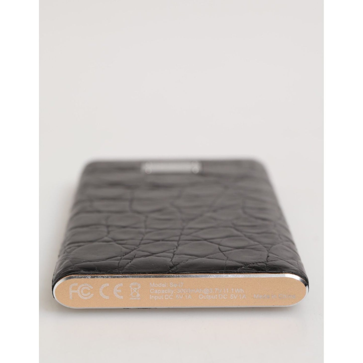 Dolce & Gabbana Black Exoctic Leather Embossed 3000mAh Power Bank Charger USB on display.