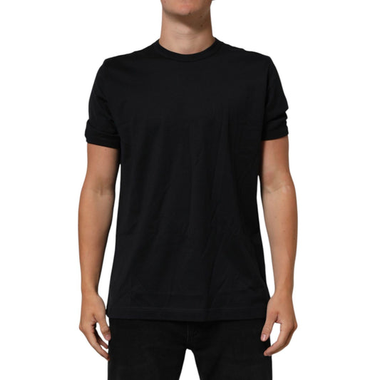 Model wearing Dolce & Gabbana Black Goodluck 2018 Cotton Crew Neck T-shirt, short sleeves, premium cotton, exclusive fashion, black color.