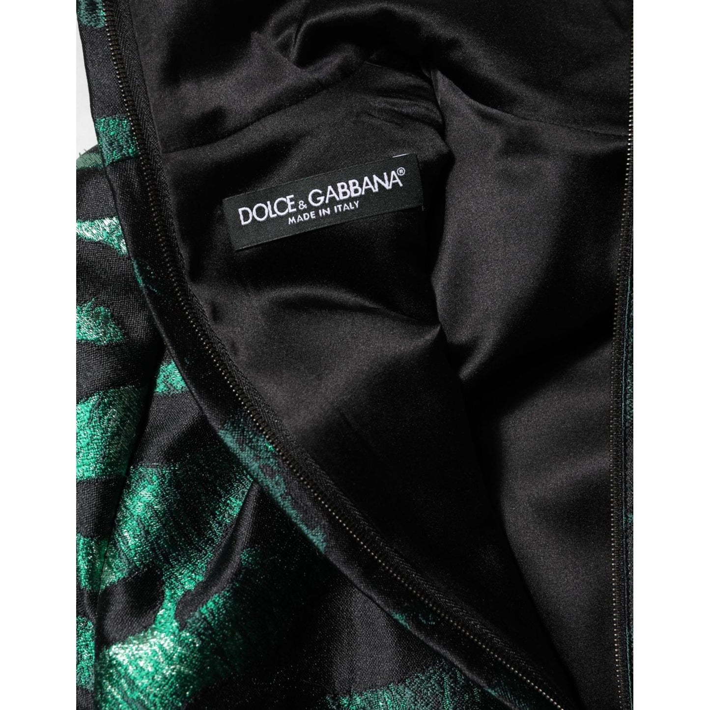 Close-up of Dolce & Gabbana Black Green Metallic Jacquard Mini Long Dress showing label and fabric details