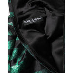 Close-up of Dolce & Gabbana Black Green Metallic Jacquard Mini Long Dress showing label and fabric details