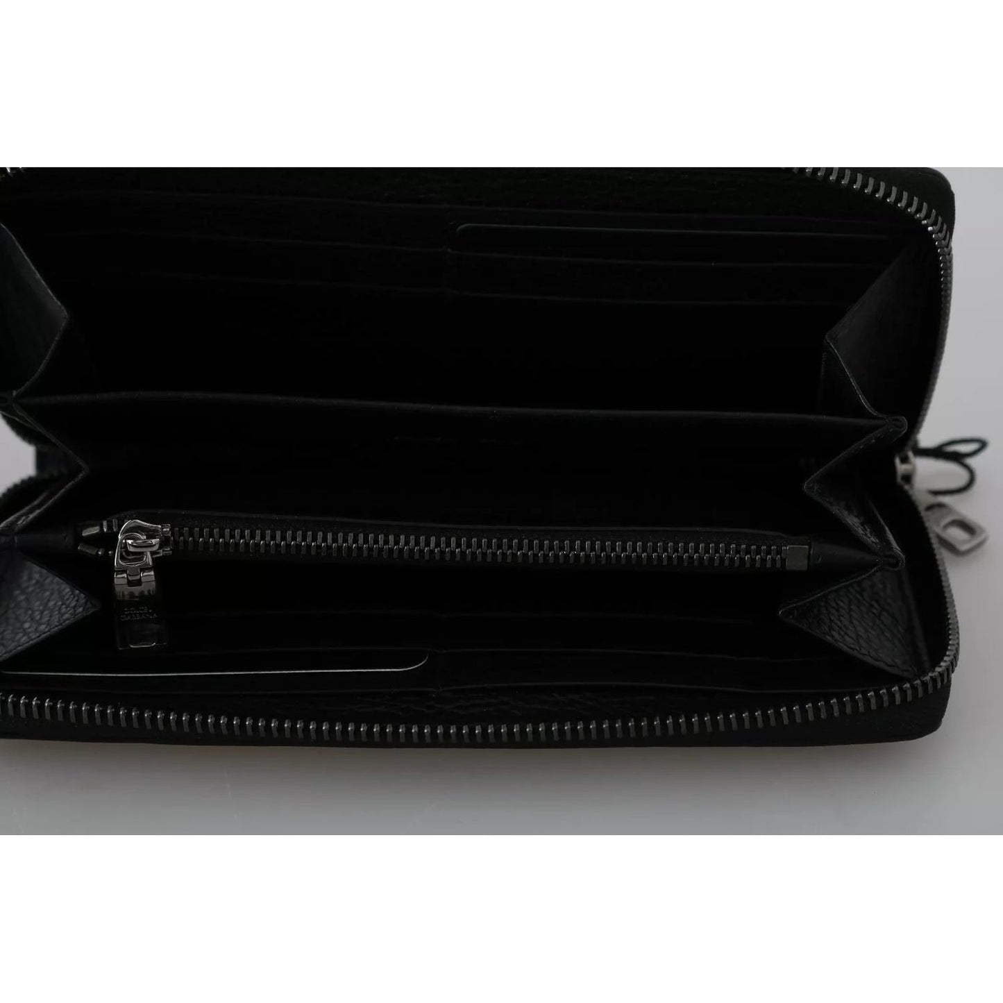 Interior view of Dolce & Gabbana Black Leather #DGFAMILY Zipper Continental Mens Wallet showing compartments and zipper detail.