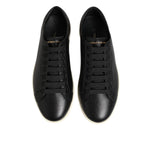 Dolce & Gabbana Black Leather Lace Up Low Top Sneakers Shoes featuring an elegant black design and traditional lace-up closure.