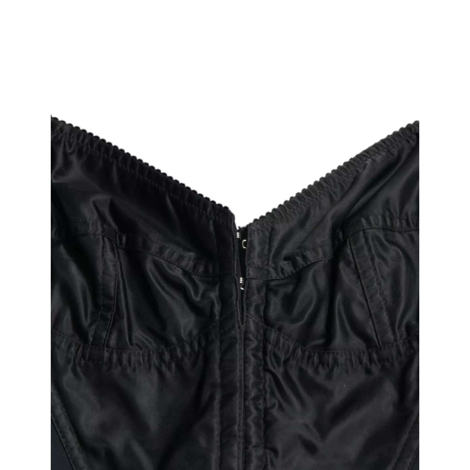 Front view with bag zipped and handles upright.