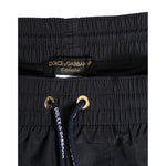 Dolce & Gabbana Black Nylon Side Logo Tape Shorts Swimwear with drawstring waistband and logo details.