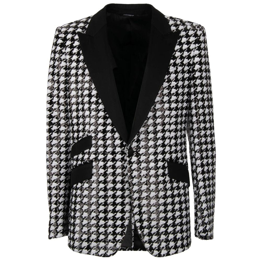 Dolce & Gabbana Black Polyester Blazer with houndstooth pattern, sequin lining, peak lapel, one-button closure, three flap pockets.