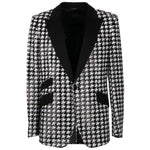 Dolce & Gabbana Black Polyester Blazer with houndstooth pattern, sequin lining, peak lapel, one-button closure, three flap pockets.