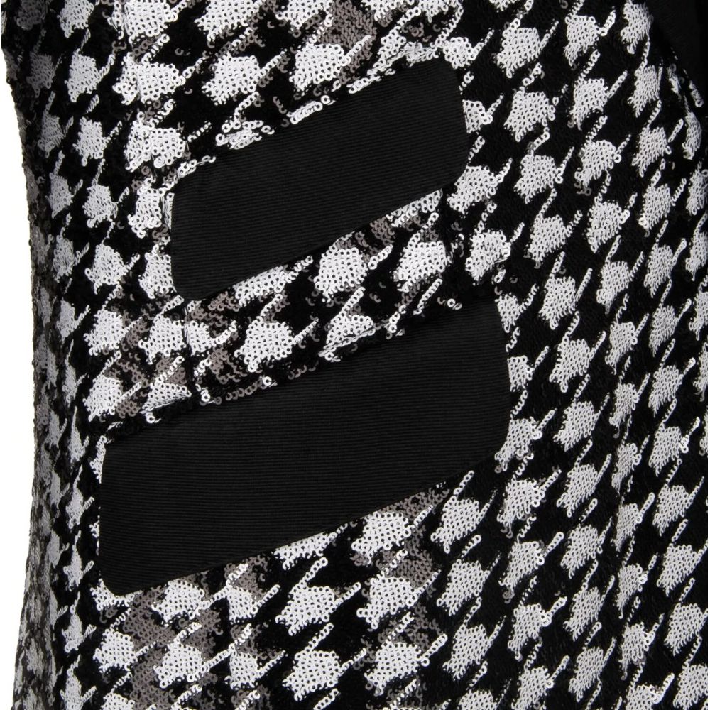 Dolce & Gabbana Black Polyester Blazer close-up of houndstooth sequin-lined fabric and chest pocket design details.