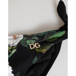 Dolce & Gabbana Black Side Tie Floral Bikini Bottom Swimwear featuring adjustable ties and logo detail on black floral fabric.