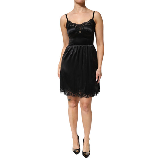 Dolce & Gabbana Black Silk Blend Lace Trim Sleeveless Mini Dress with adjustable straps displayed on a model, perfect for evening wear.