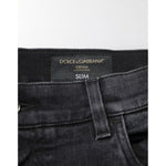 Dolce & Gabbana Black Slim Fit Stretch Men Denim Pants Jeans label and waistband close-up view.