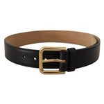 Dolce & Gabbana Black Solid Leather Classic Gold Waist Buckle Belt with logo engraved, luxurious women's accessory.