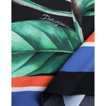 Close-up of Dolce & Gabbana Black Strelitzia High Waist Wrap Midi Skirt with floral pattern and logo detail