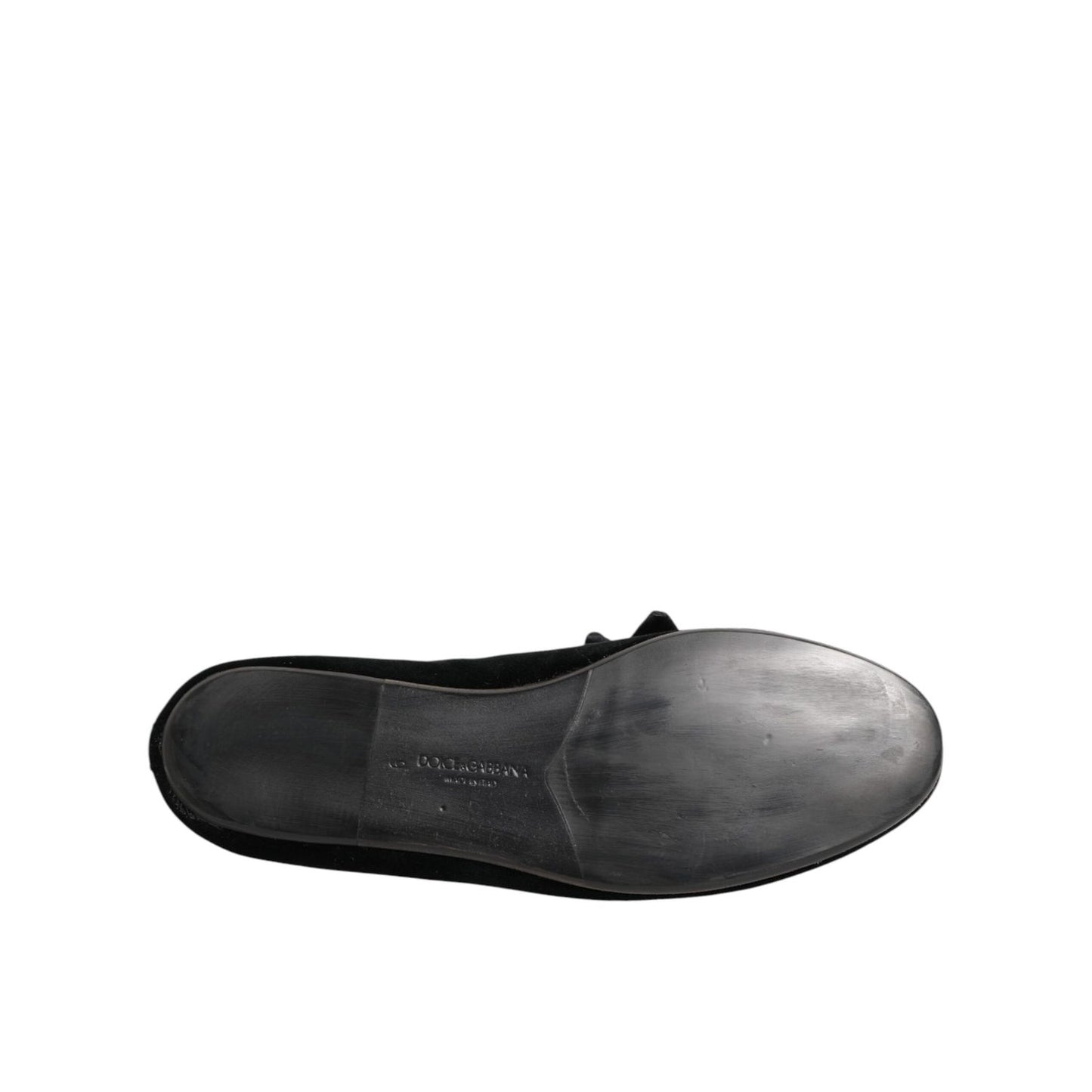 Underside view of Dolce & Gabbana Black Suede Cotton Rose Slip On Loafers Shoes showing sole details.