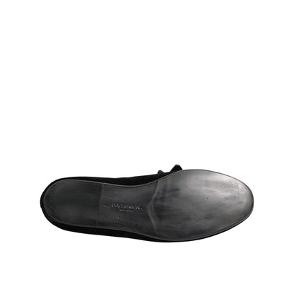 Underside view of Dolce & Gabbana Black Suede Cotton Rose Slip On Loafers Shoes showing sole details.