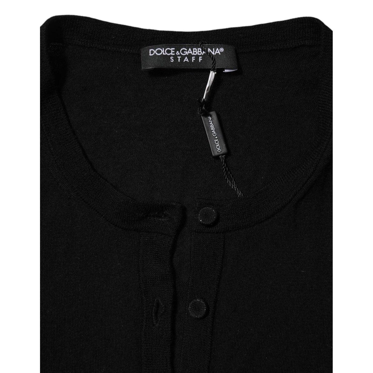 Dolce & Gabbana Black Virgin Wool Buttoned Cardigan Sweater showing tag detail and button front closure.
