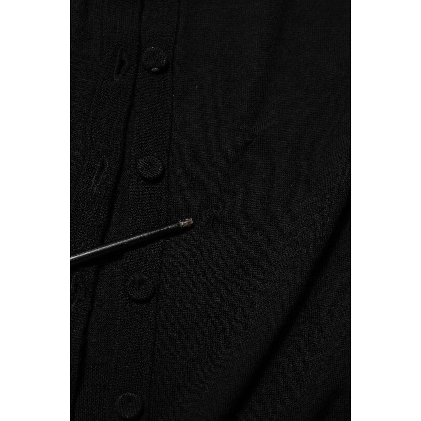 Detailed view of Dolce & Gabbana Black Virgin Wool Buttoned Cardigan Sweater showing buttons and texture
