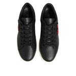 Top view of Dolce & Gabbana Black White Leather Crystal Heart Sneakers Shoes with black leather and red crystal heart patch.