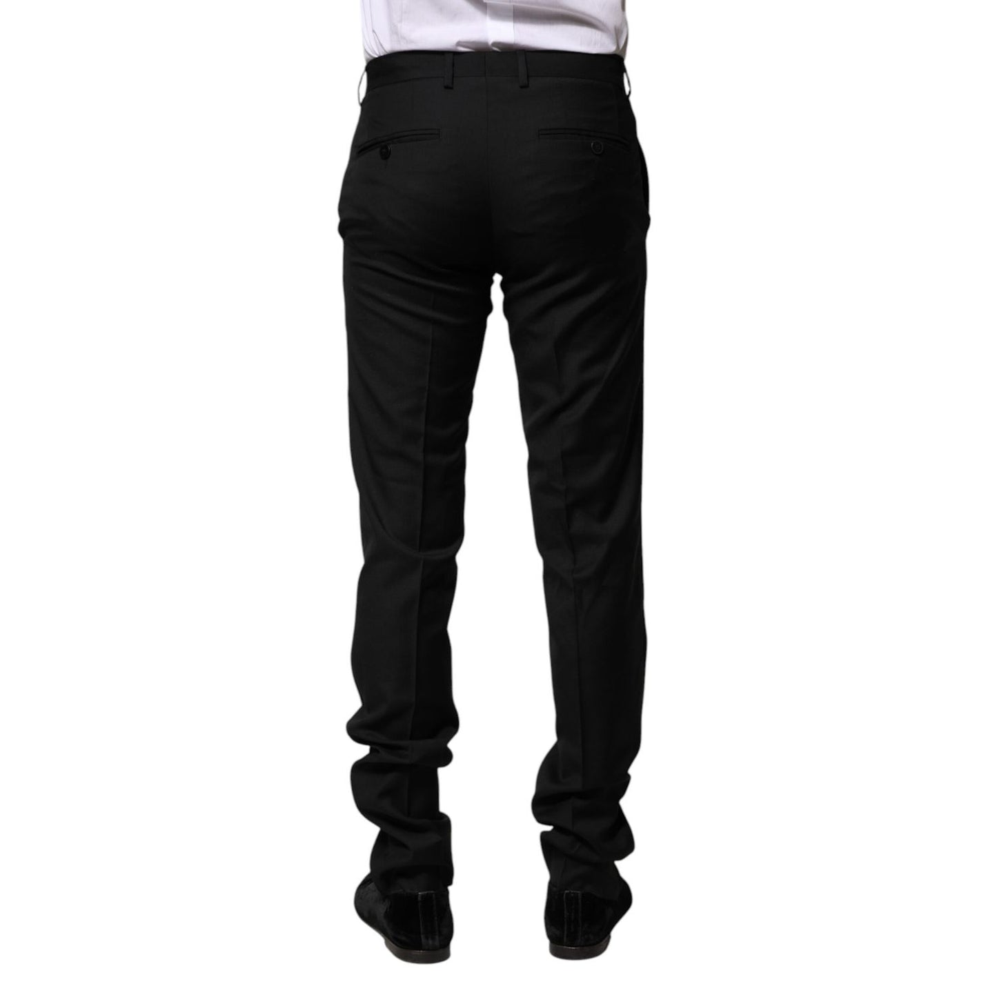 Back view of Dolce & Gabbana Black Wool Formal Men Slim Pants, featuring two back pockets and elegant fit in 100% virgin wool.