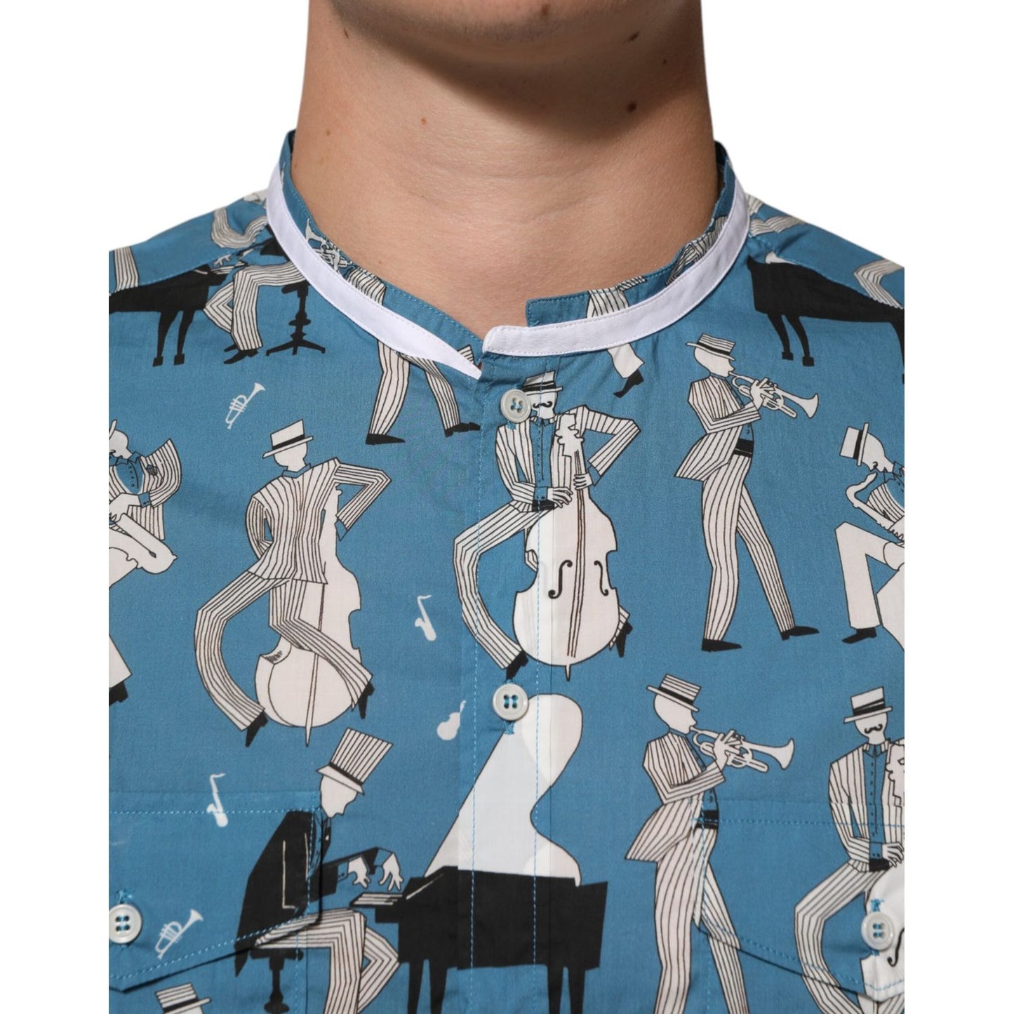 Close-up of Dolce & Gabbana Blue Jazz Printed Cotton Button Front Shirt with musical note and musician design.