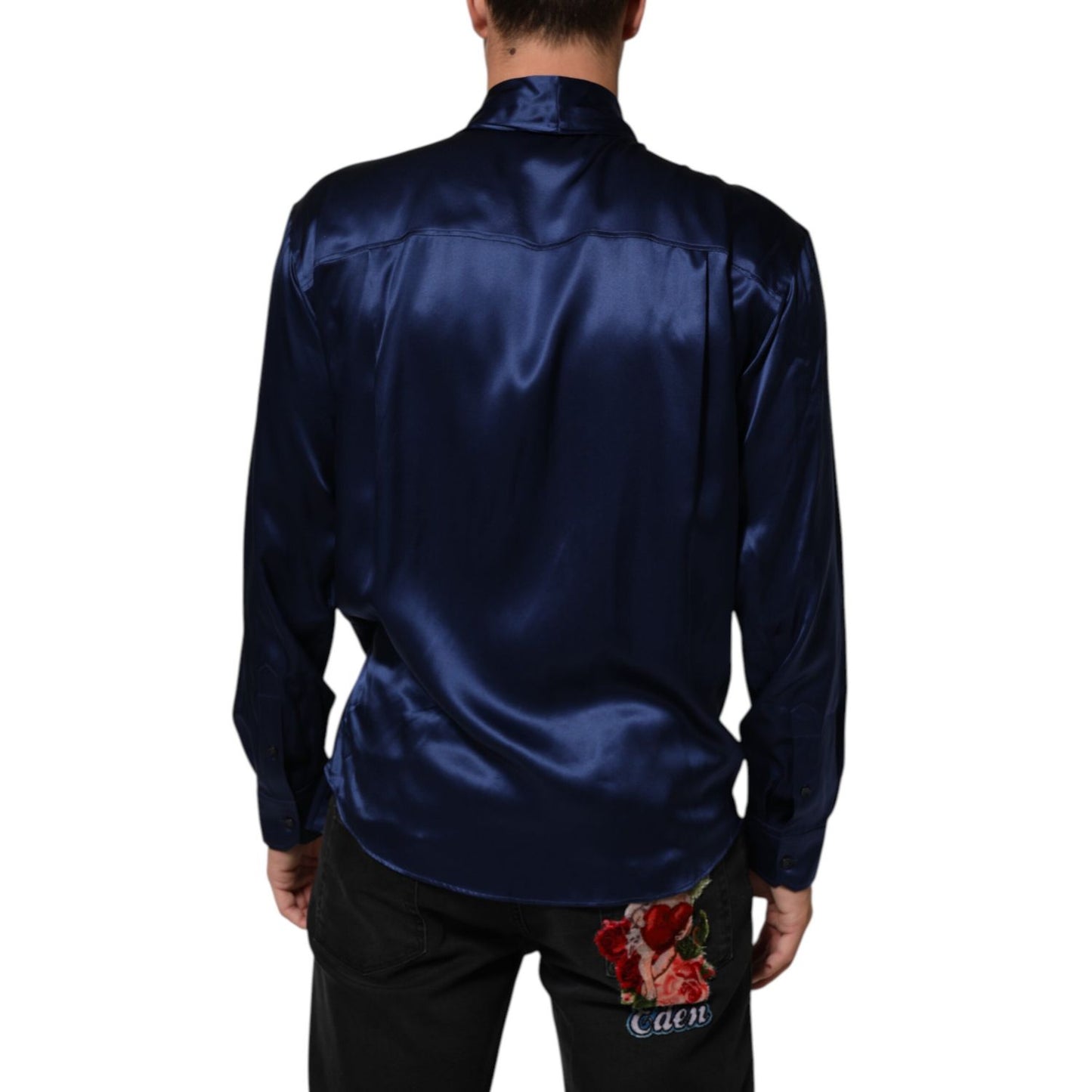 Man wearing Dolce & Gabbana Blue Oversize Silk Satin Long Sleeves Shirt, showcasing the smooth silk back design.