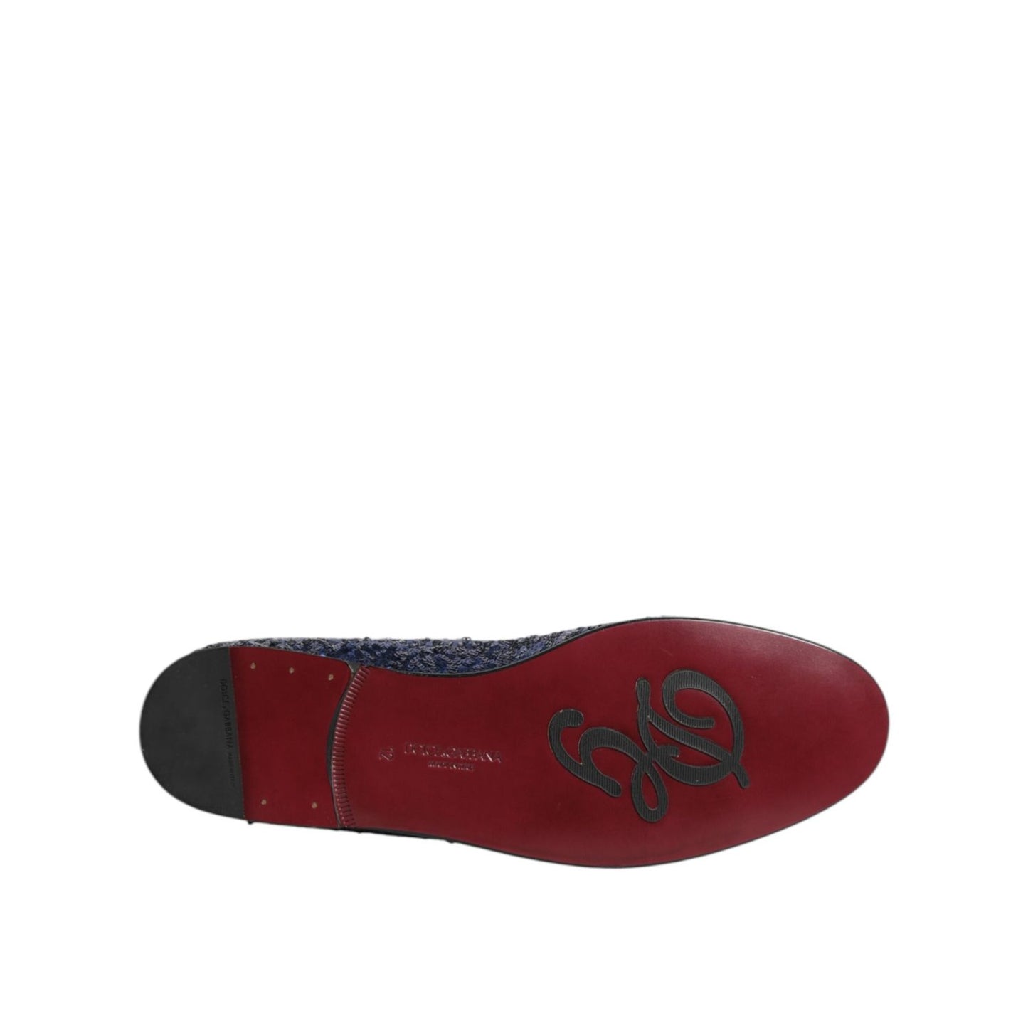 Sole view of Dolce & Gabbana Blue Sequined Loafers Slippers Men Dress Shoes with red leather detailing and logo.