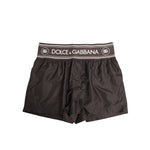 Dolce & Gabbana Brown Polyester Logo Elastic Waistband Swimwear, stylish swim shorts with logo waistband, 100% polyester.