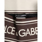 Close-up of Dolce & Gabbana Brown Polyester Logo Elastic Waistband Swimwear showcasing logo and elastic detail.