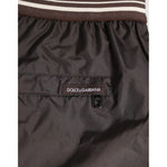 Dolce & Gabbana Brown Polyester Logo Elastic Waistband Swimwear with branded waistband and pocket detail close-up.