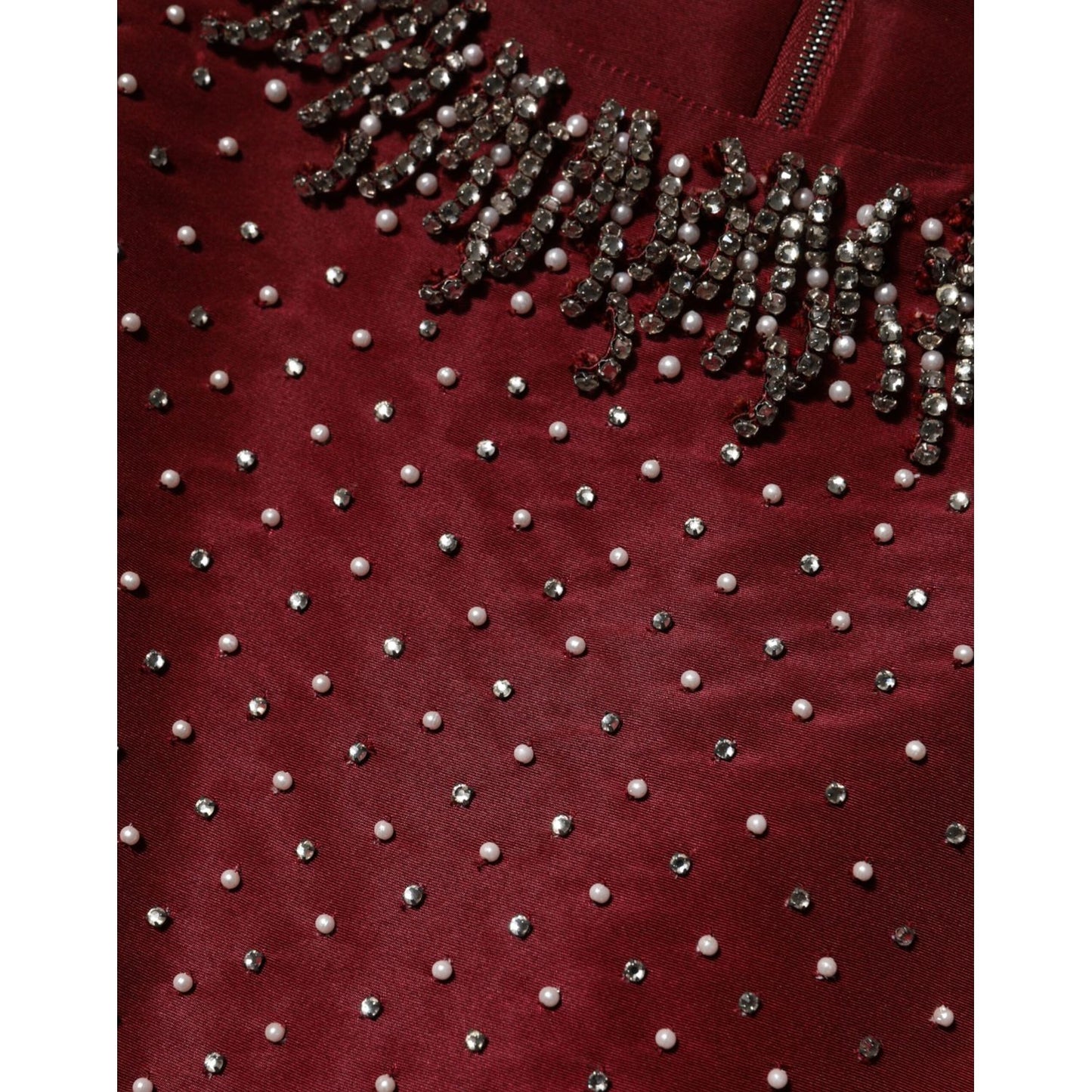 Close-up of Dolce & Gabbana Burgundy Silk Beaded Evening Gown Dress, showing intricate beadwork and luxurious fabric texture.