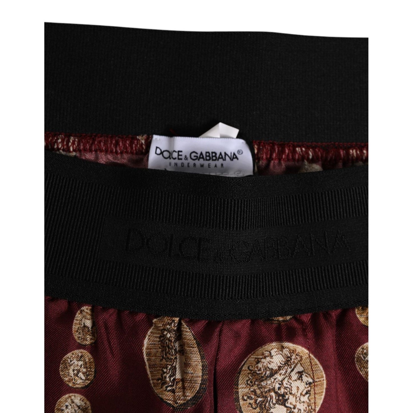 Dolce & Gabbana Burgundy Silk Coin Print Men Boxer Short Swimwear with elastic waistband and luxury coin print design.