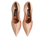 Dolce & Gabbana Cipria Nude Satin Mesh Stiletto Pumps Shoes with pointed toe and elegant design for formal occasions.