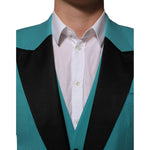 Close-up of Dolce & Gabbana Cyan 3 Piece Wool Silk Blend Suit SICILIA with black satin lapels, emphasizing luxurious tailoring.