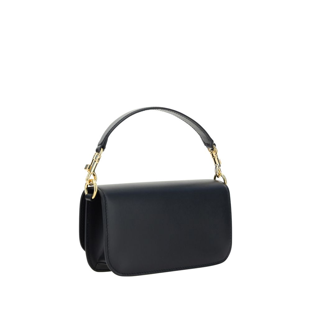 Front view with bag zipped and handles upright.