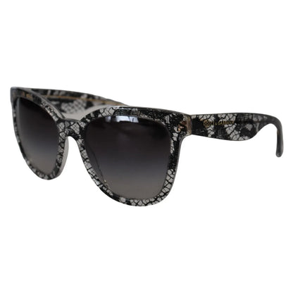 Dolce & Gabbana DG4190 Black Lace Acetate Crystal Round Sunglasses with gray gradient lenses for women, offering 100% UVA protection.