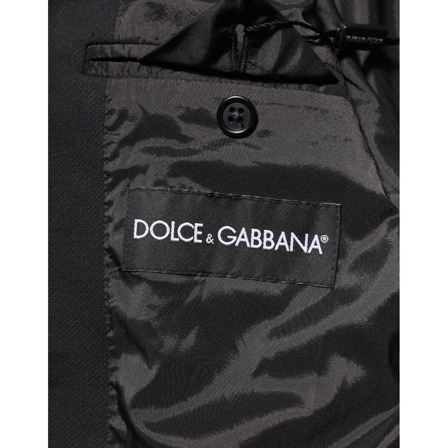 Inner label of Dolce & Gabbana Dark Blue Cotton Men Jacket Coat Blazer Suit showing black satin lining and brand logo.