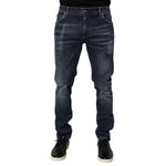Dolce & Gabbana Dark Blue Washed Running Ripped Denim Jeans featuring distressed details and modern silhouette, perfect for streetwear.