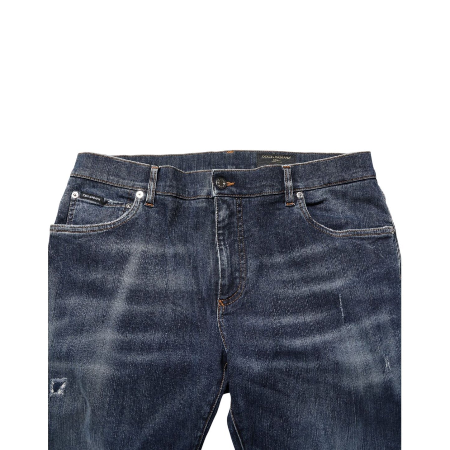 Dolce & Gabbana Dark Blue Washed Running Ripped Denim Jeans with distressed details and zip-button closure.