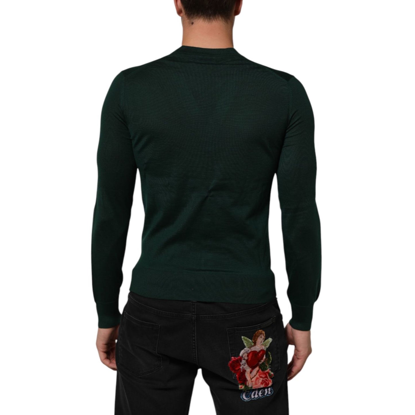 Back view of Dolce & Gabbana Dark Green Button Down Men Cardigan Sweater on model, displaying elegant tailoring.