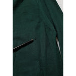 Close-up of Dolce & Gabbana Dark Green Button Down Men Cardigan Sweater fabric detail showing texture and quality.