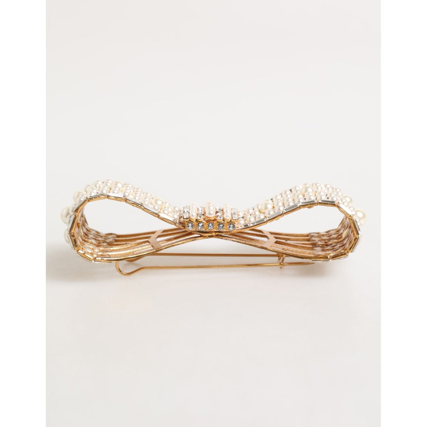 Dolce & Gabbana Gold Brass Glas Crystal Faux Pearl Embellished Brooch featuring a bow design with shimmering crystals and pearlescent accents.