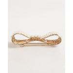 Dolce & Gabbana Gold Brass Glas Crystal Faux Pearl Embellished Brooch featuring a bow design with shimmering crystals and pearlescent accents.