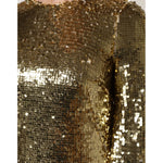 Close-up of Dolce & Gabbana Gold Sequin Long Sleeve Mini Dress showcasing shimmering sequin design and luxurious fabric texture.