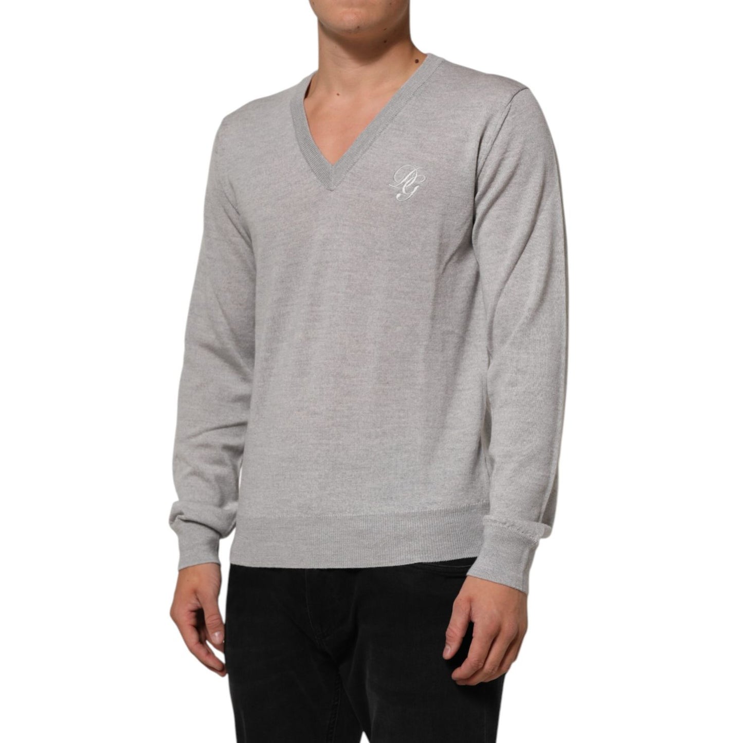 Dolce & Gabbana Gray Wool Knit Logo V-Neck Pullover Sweater featuring elegant design and logo detail, perfect for a sophisticated look.