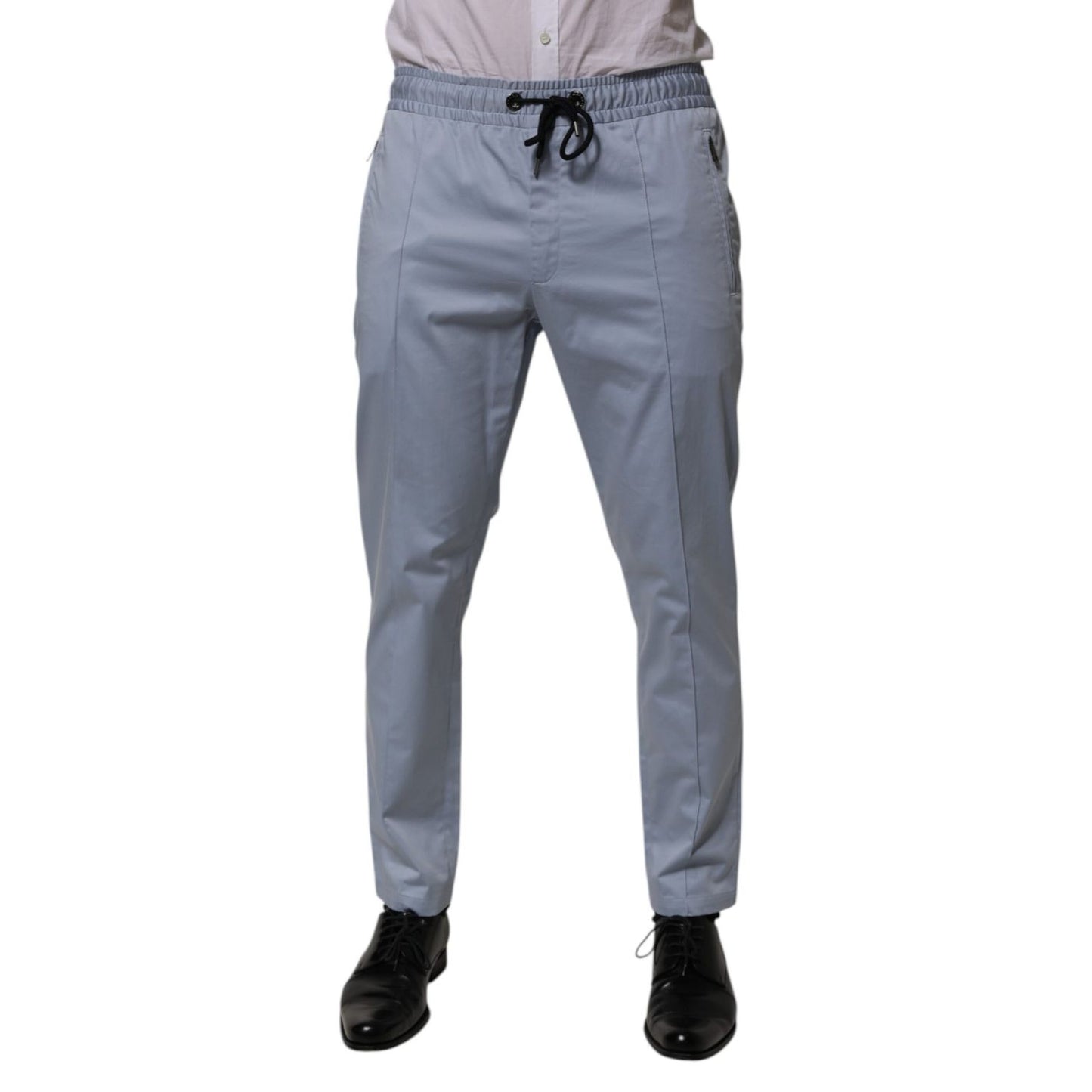 Dolce & Gabbana Light Blue Cotton Drawstring Elastic Waist Men Pants, jogger style with slim fit and logo details.